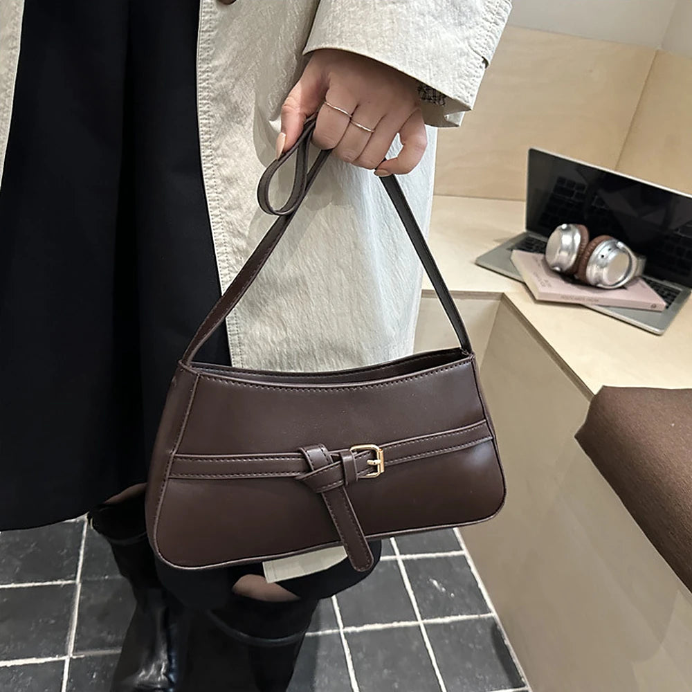 Isla vegan leather shoulder bag with knotted buckle strap