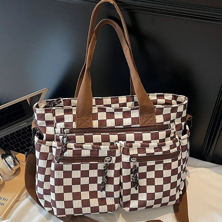 Kanna checkered corduroy shoulder bag with front zip pockets