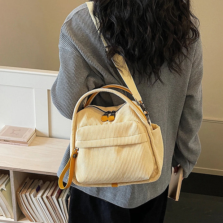 Lyona corduroy crossbody bag with front zip pocket