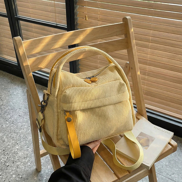 Lyona corduroy crossbody bag with front zip pocket