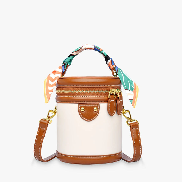 Romy vegan leather crossbody bucket bag with scarf-wrapped handle in Beige / Brown