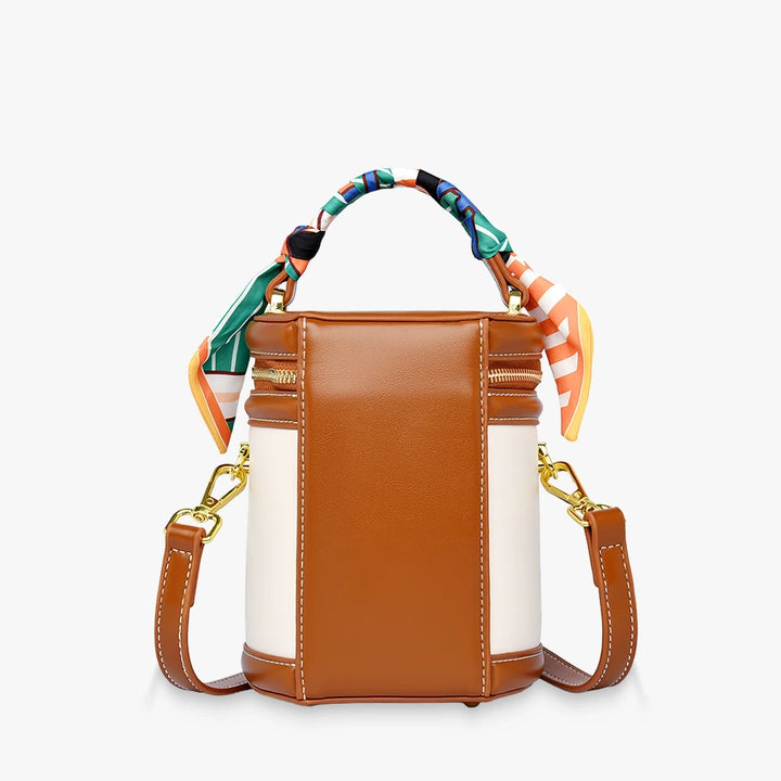 Romy vegan leather crossbody bucket bag with scarf-wrapped handle in Beige / Brown