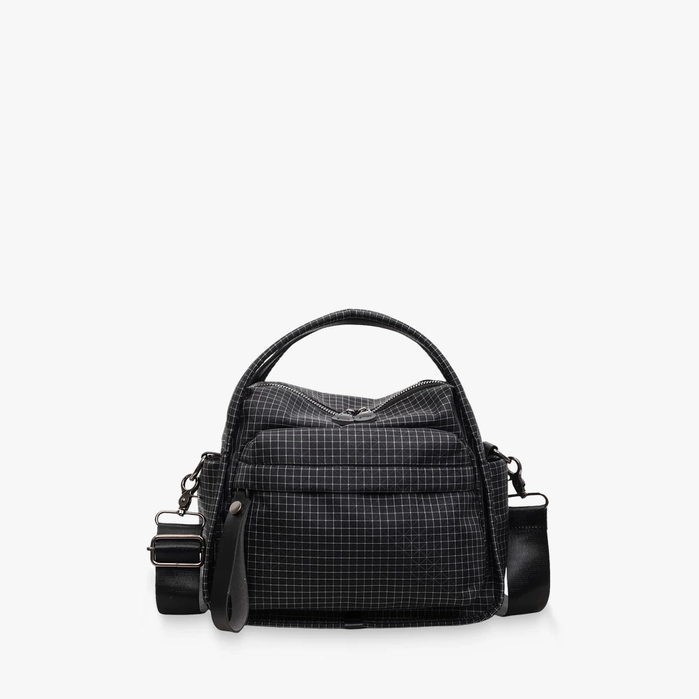 Lyona grid fabric crossbody bag with front zip pocket in Black