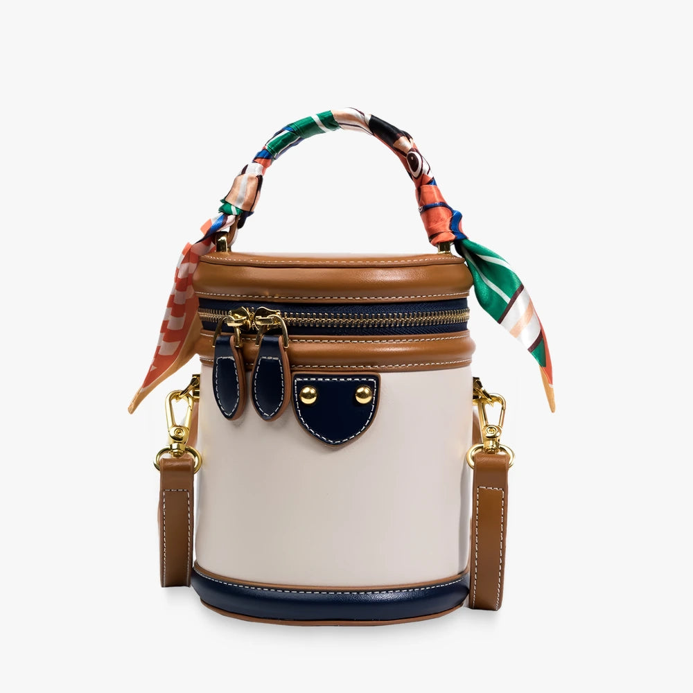 Romy vegan leather crossbody bucket bag with scarf-wrapped handle in Beige / Navy