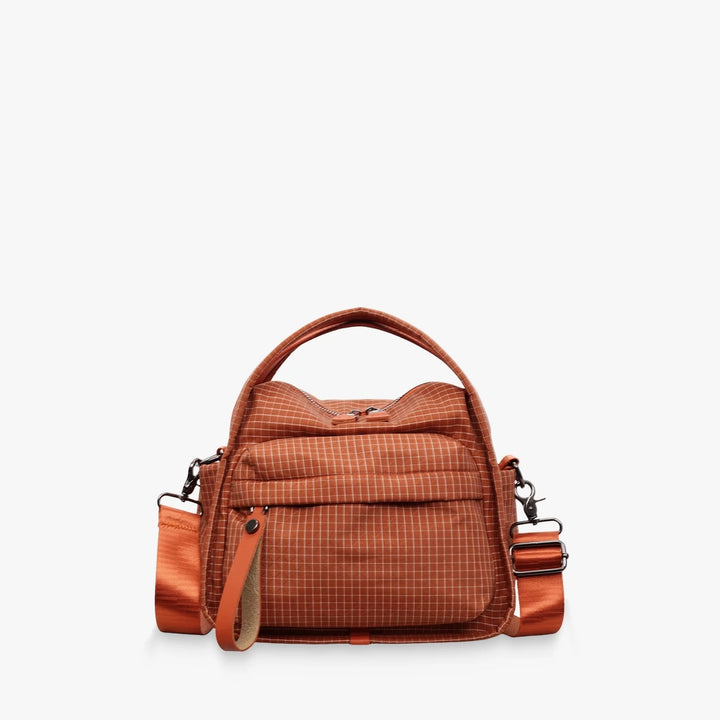 Lyona grid fabric crossbody bag with front zip pocket in Orange