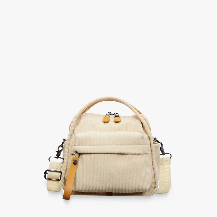 Lyona corduroy crossbody bag with front zip pocket in Cream