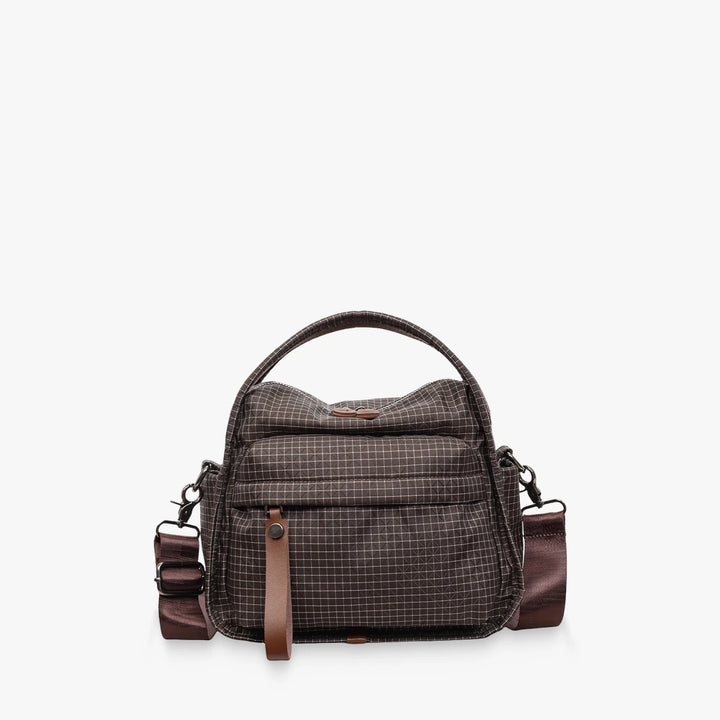 Lyona grid fabric crossbody bag with front zip pocket in Brown