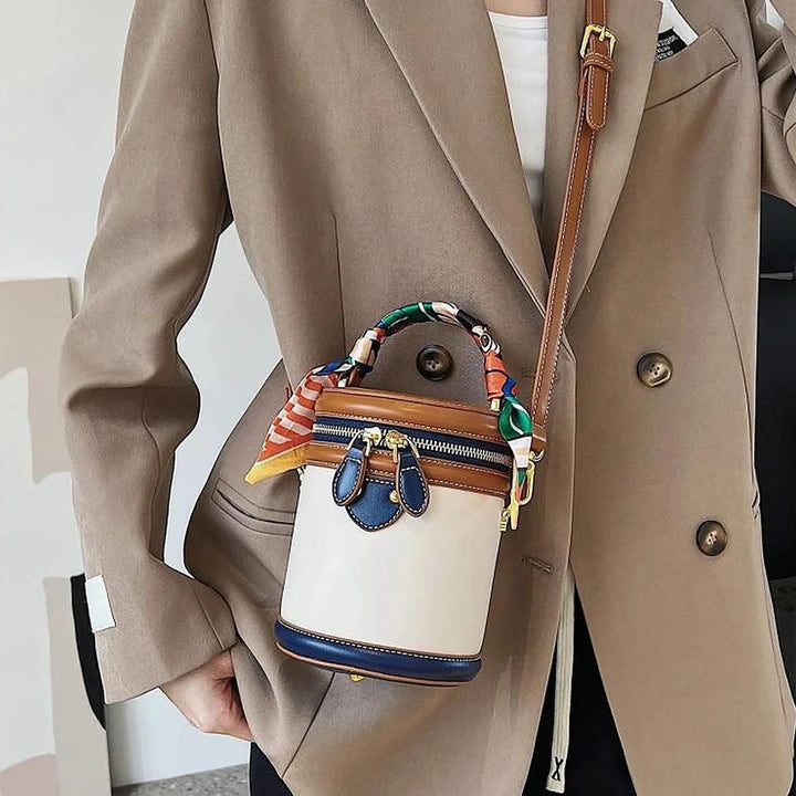 Romy vegan leather crossbody bucket bag with scarf-wrapped handle