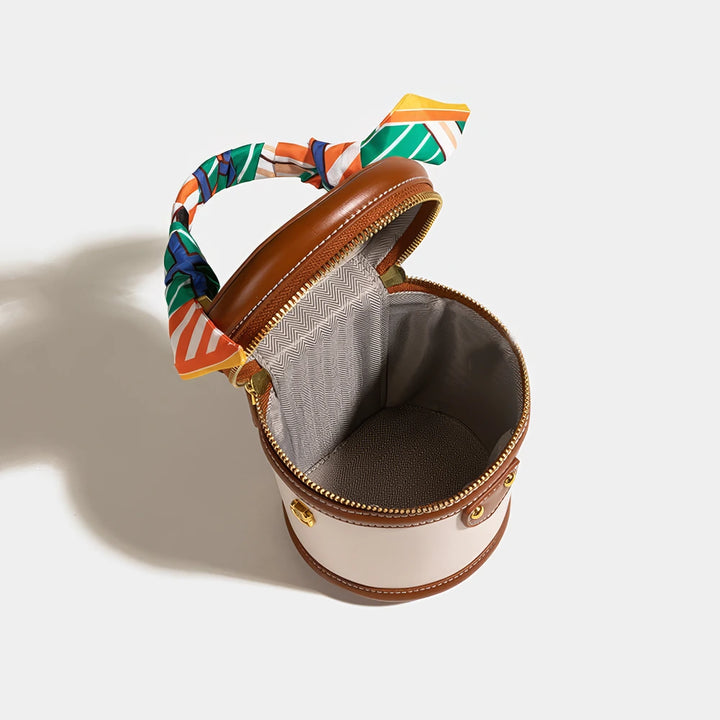 Romy vegan leather crossbody bucket bag with scarf-wrapped handle